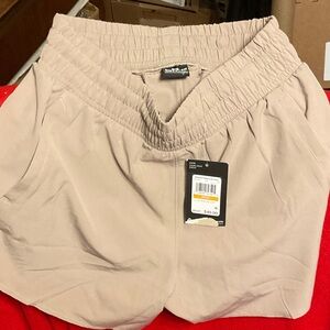 Under Armour High-Waist V-Band Shorts — Light Beige